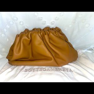 Bottega Veneta teak leather pouch handbag.